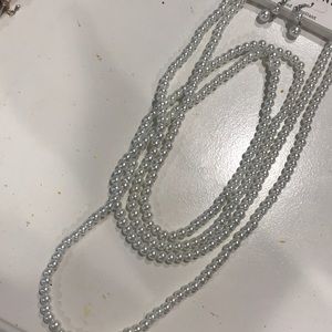 Long pearl necklace